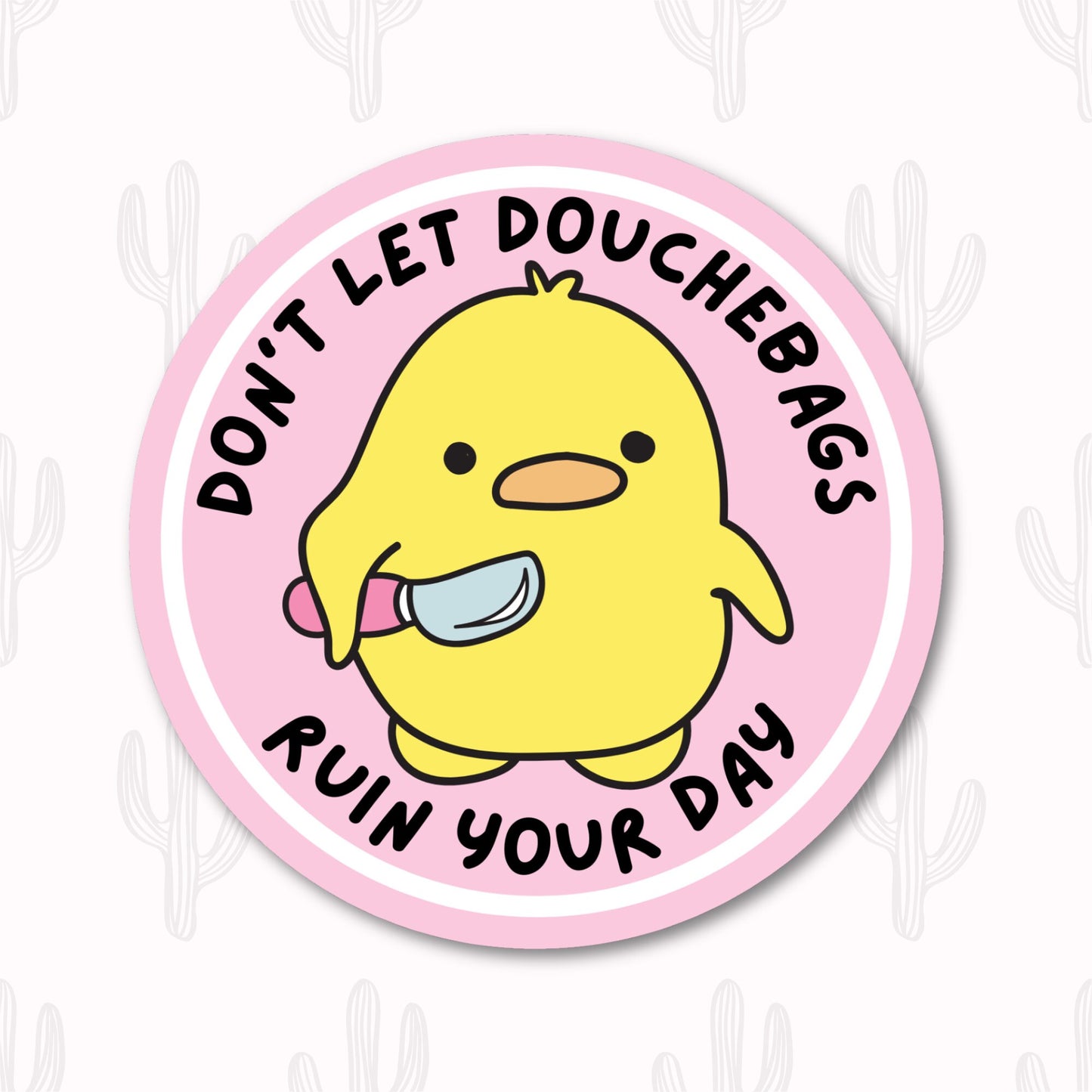 A round sticker featuring an adorable yellow duck holding a small knife, with the phrase "Don't Let Douchebags Ruin Your Day" written in black text around the duck.