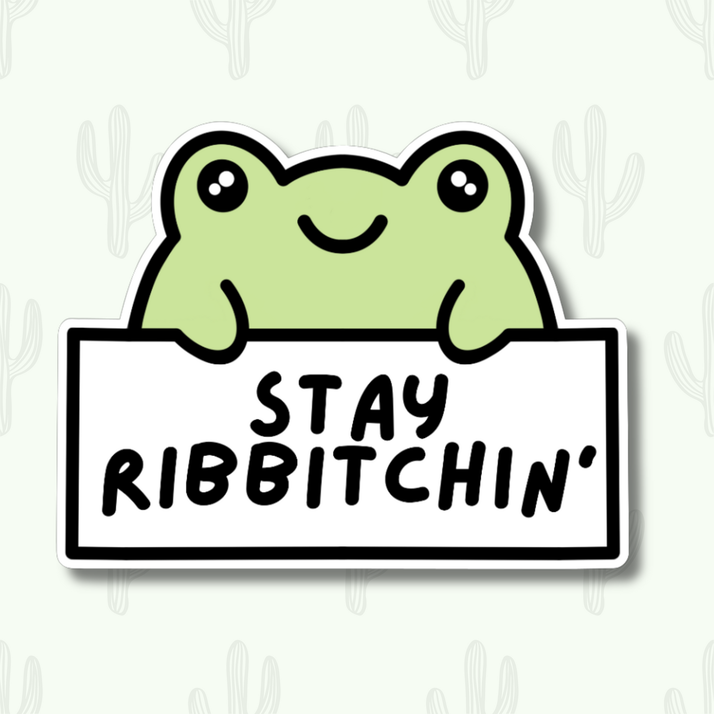 A sticker featuring a green frog holding a white sign with the text 'Stay Ribbitchin'