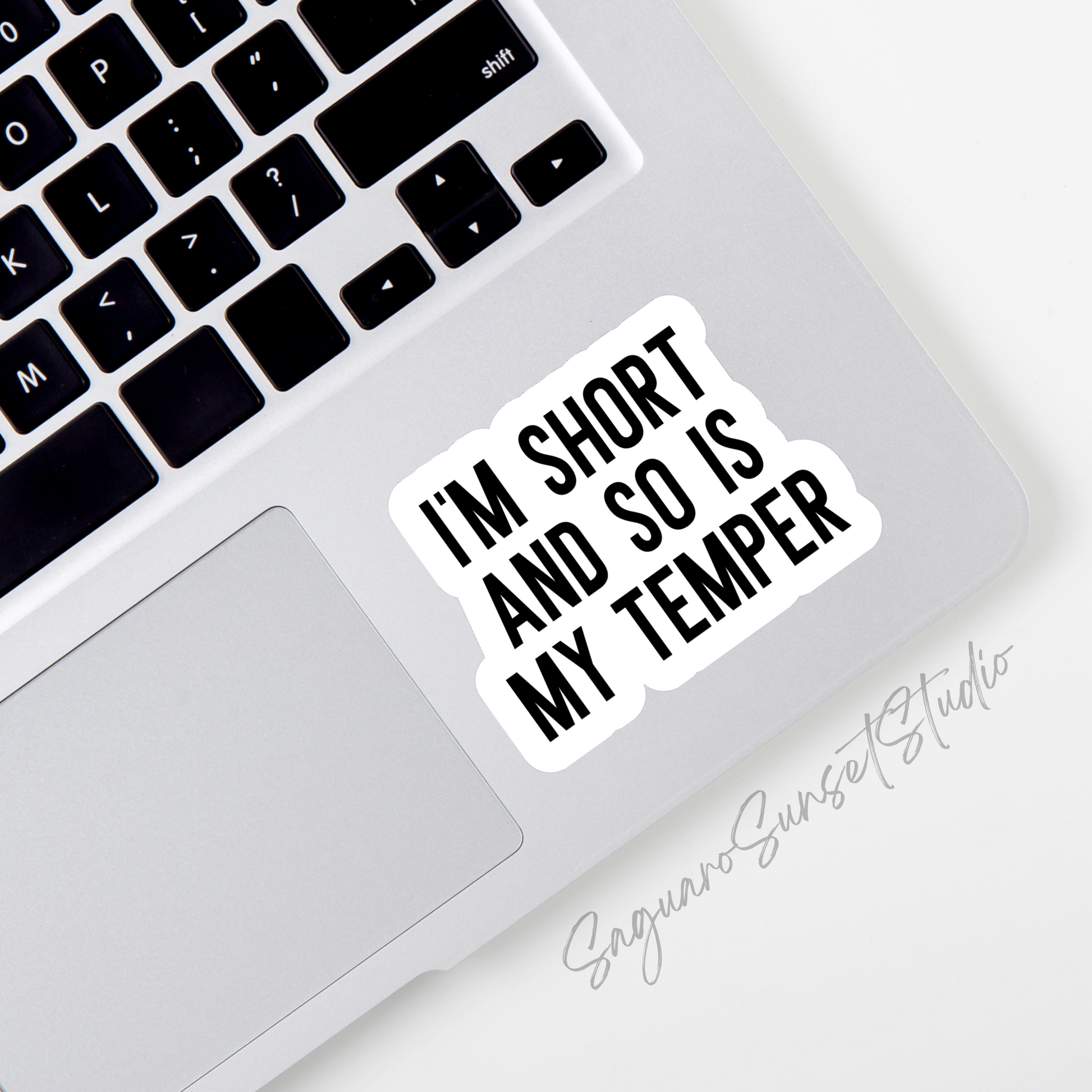 Sticker with the text "I'm Short and So Is My Temper" in bold black letters. Perfect for adding humor and personality