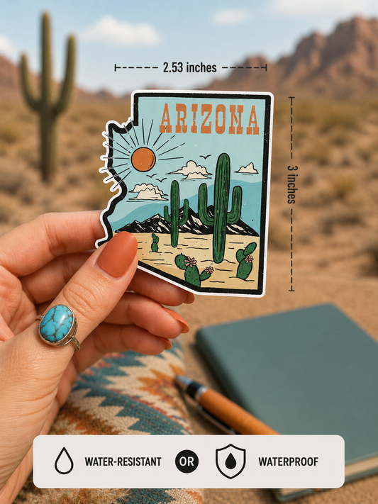 A hand holds a die-cut Arizona state-shaped sticker with a desert illustration and the word ARIZONA. The image includes dimension markers showing 2.53 inches wide by 3 inches long