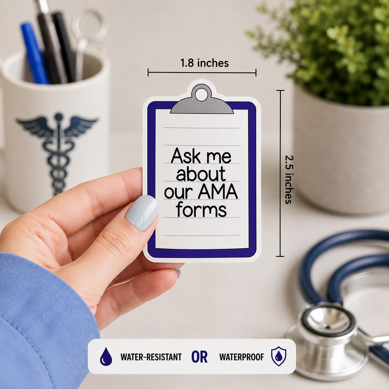 A hand holds a small clipboard-shaped product labeled 'Ask me about our AMA forms' in a medical-themed setting with a stethoscope, pen cup, and plant. Measurement callouts show 1.8 inches wide by 2.5 inches tall.