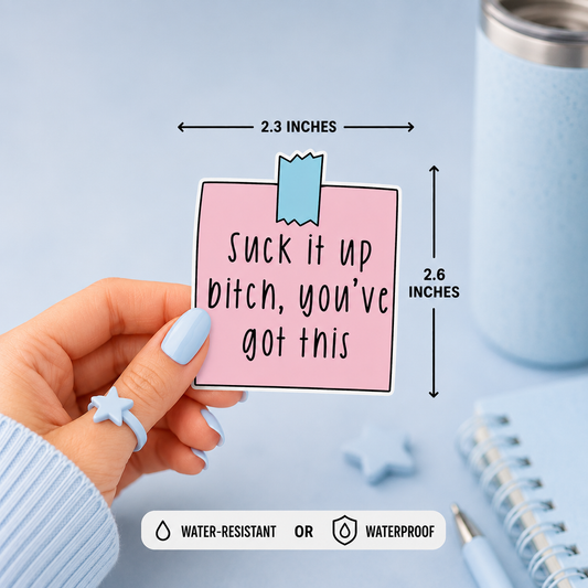 A hand holds a pink sticky note with the phrase ’suck it up bitch, you’ve got this', shown with dimension arrows indicating 2.3 inches by 2.6 inches tall.