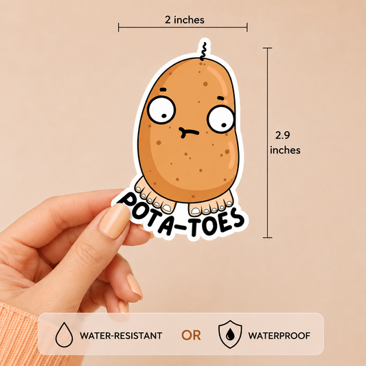 A hand holds a die-cut sticker featuring a cartoon potato character labeled 'POTA-TOES' against a warm beige background. Measurement lines show the sticker is 2 inches wide and 2.9 inches tall