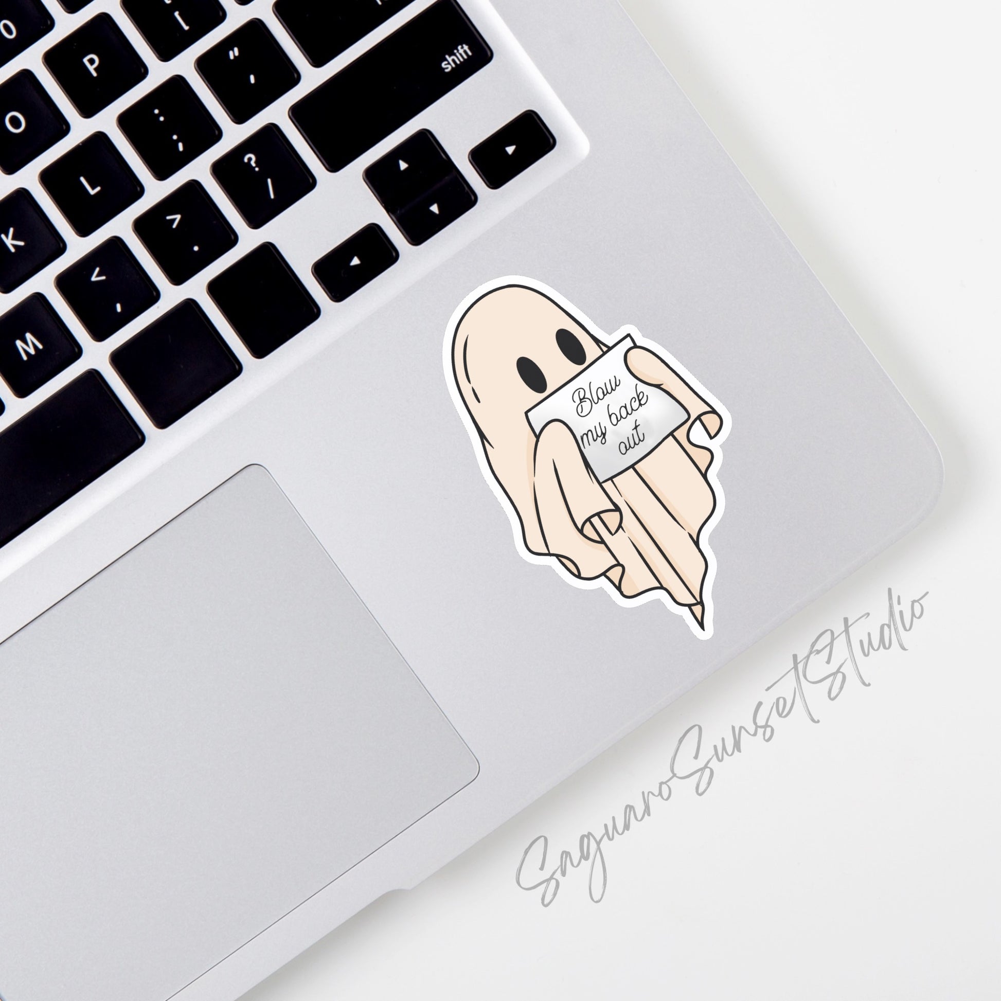 A vinyl sticker featuring a cute ghost holding a sign that says "Blow My Back Out,"