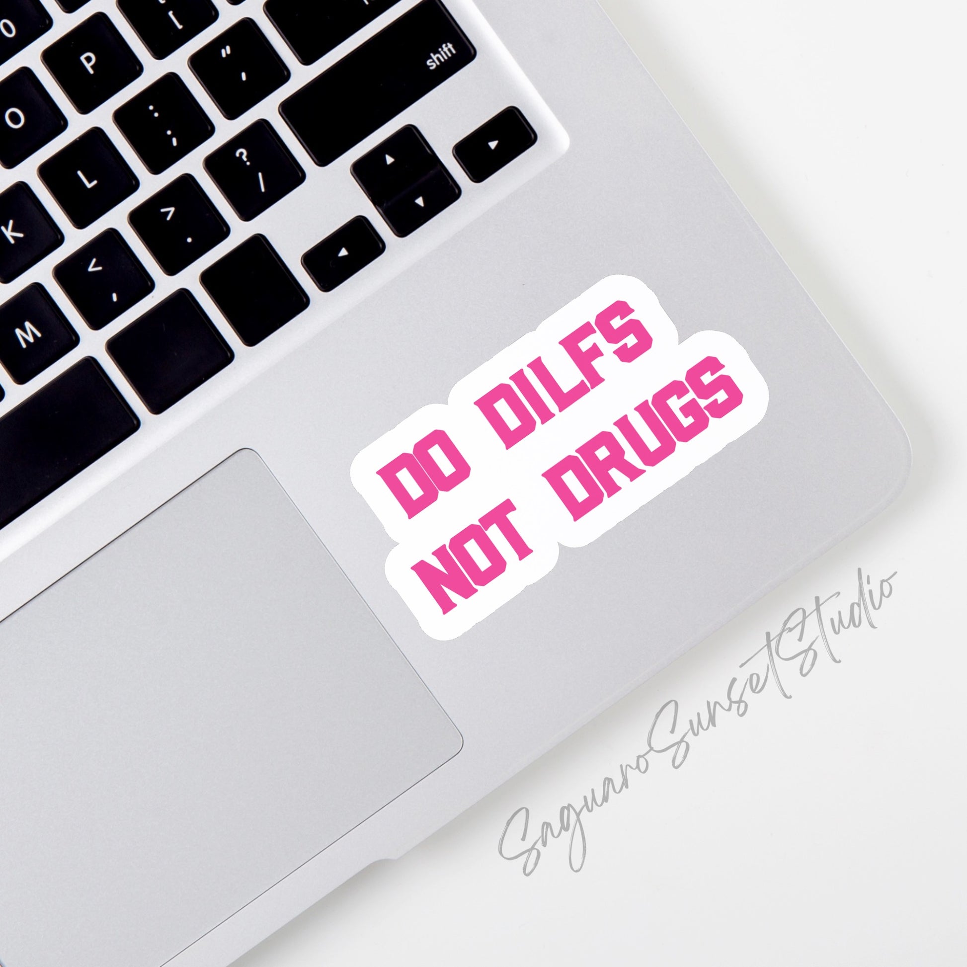 A white sticker with bold, pink text that reads "Do DILFs Not Drugs" in a bold stylized font