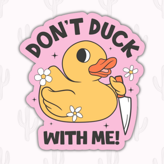 A pink sticker with a yellow rubber duck holding a knife with the phrase 'Don't duck with me!"