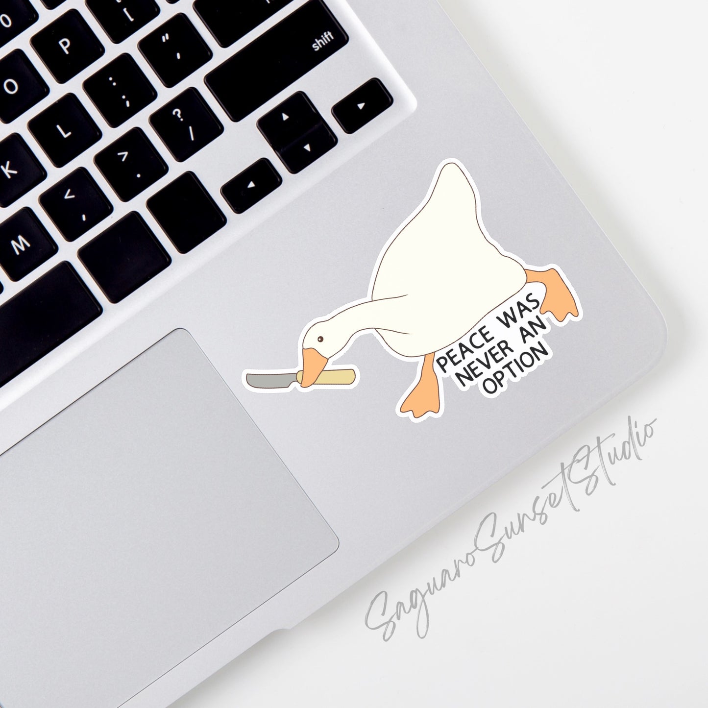 Sticker featuring a silly goose holding a knife with the phrase "Peace Was Never an Option," designed to add humor and edge to personal items.