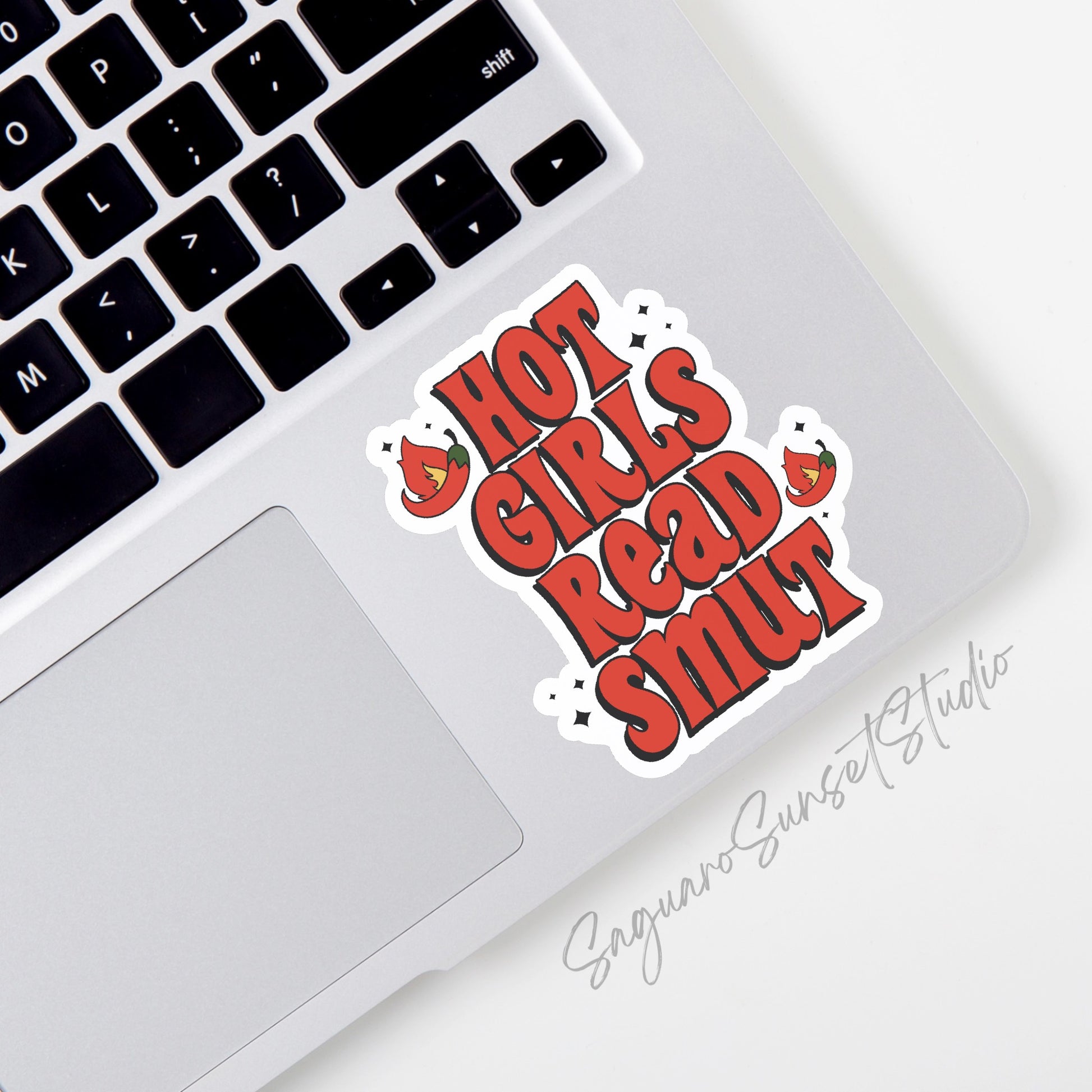 A vinyl sticker with the phrase "Hot Girls Read Smut" in bold, fiery text with playful flame accents