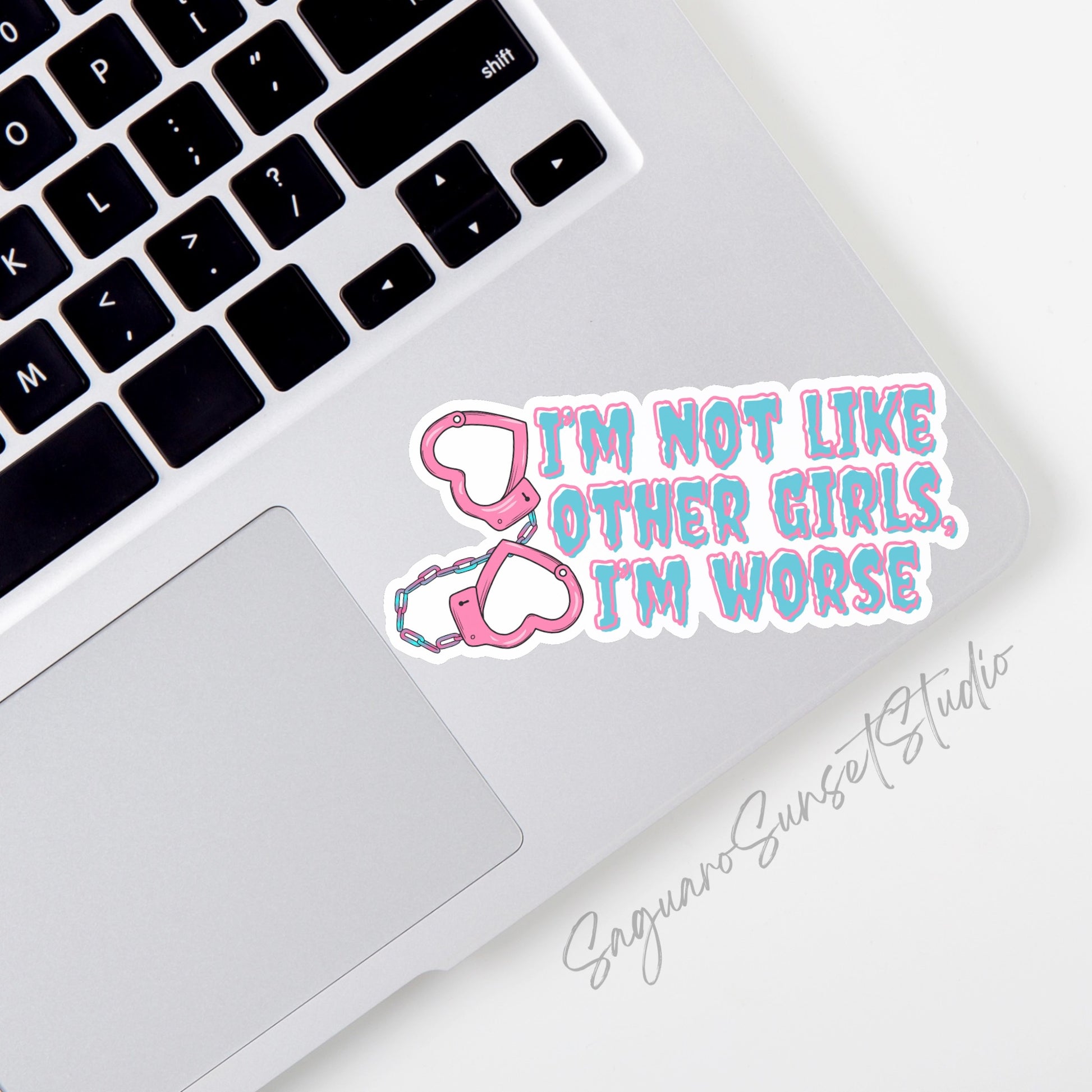 Sticker with the text "I'm Not Like Other Girls, I'm Worse" featuring pink heart-shaped handcuffs. 