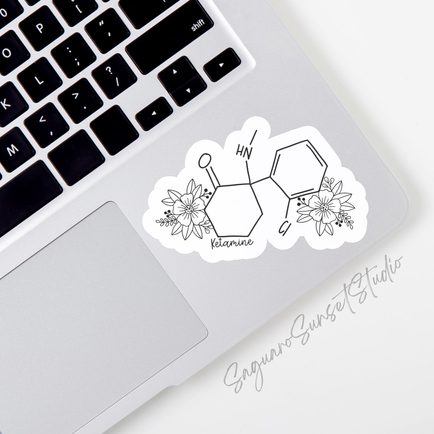 Sticker featuring a detailed illustration of the ketamine molecule with floral elements. Perfect for students, scientists, and medical professionals