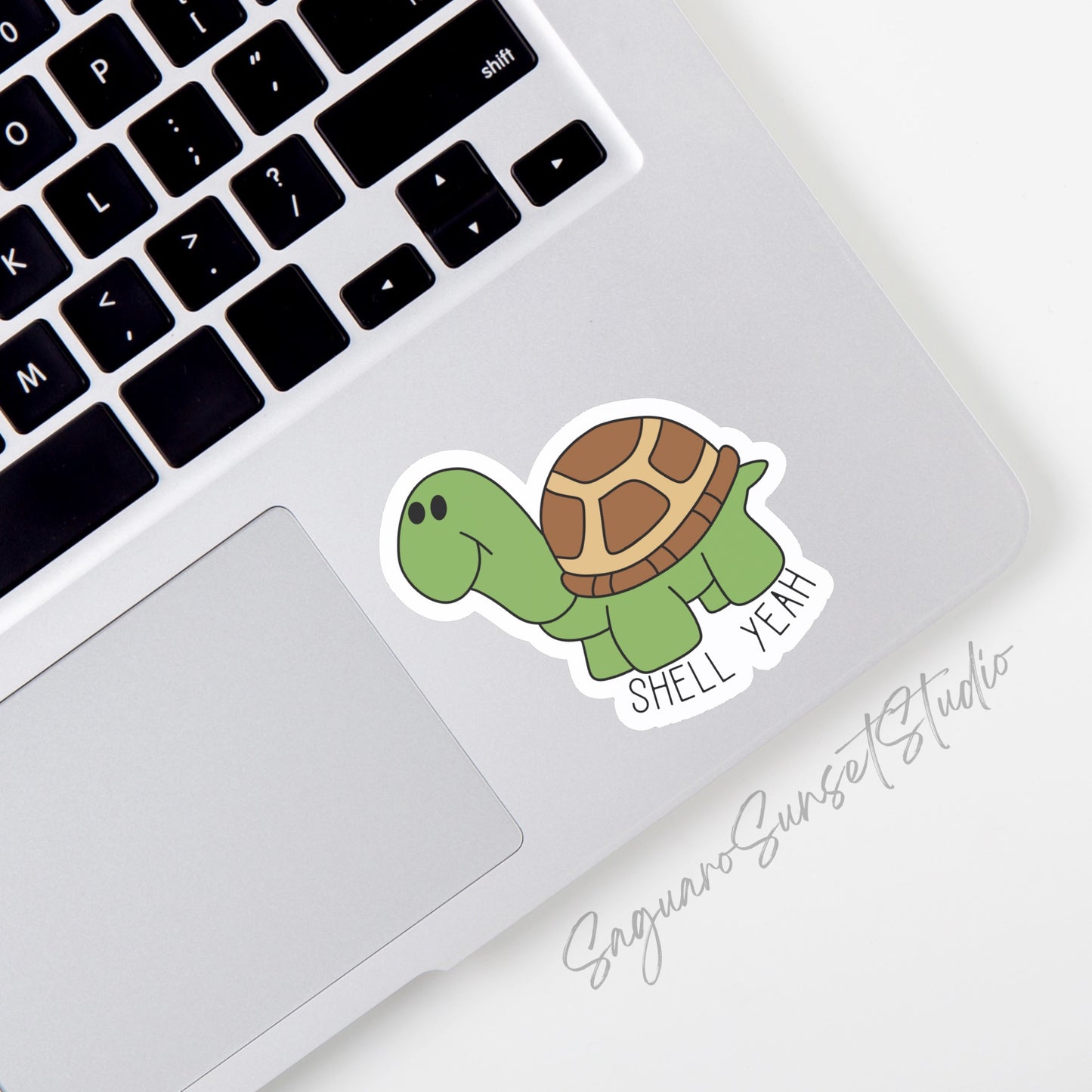 Sticker featuring a cute turtle with the phrase "Shell Yeah," designed to add fun to personal items.