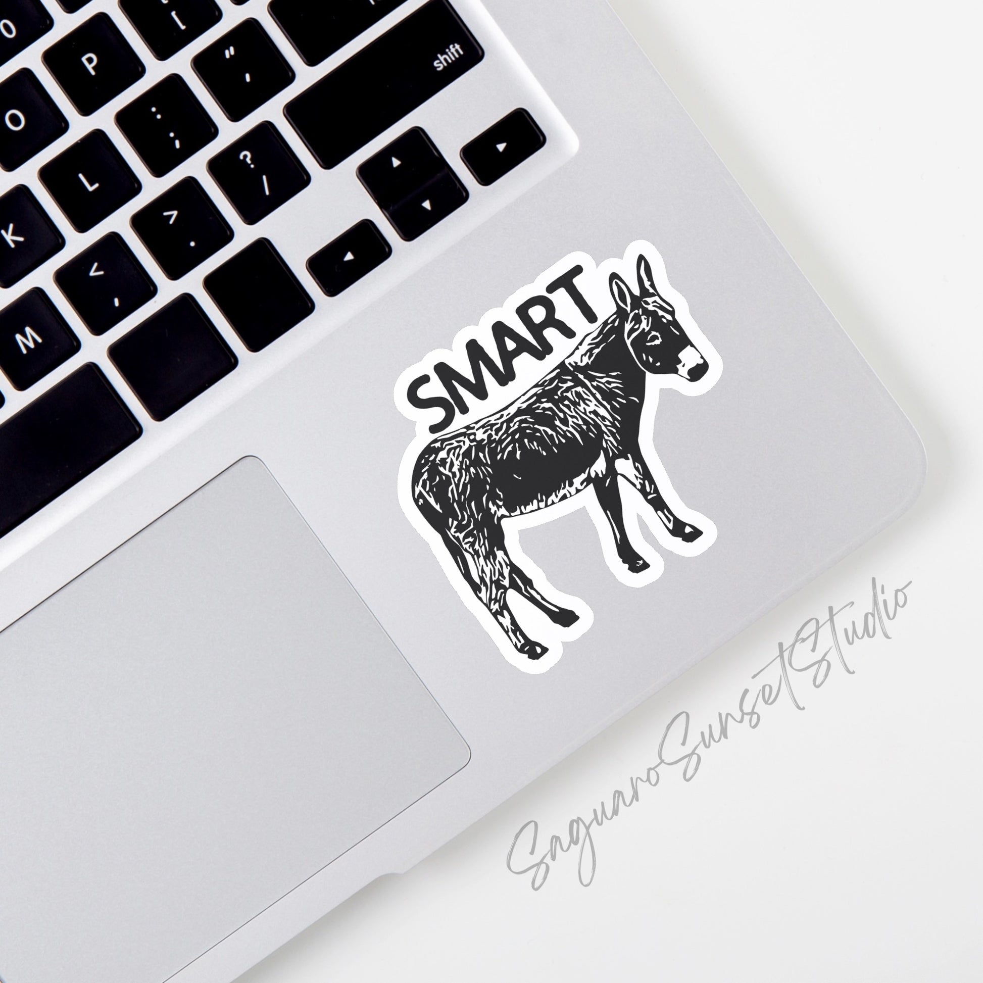 Sticker featuring a donkey (burro) with the word "SMART," designed to add humor to personal items.