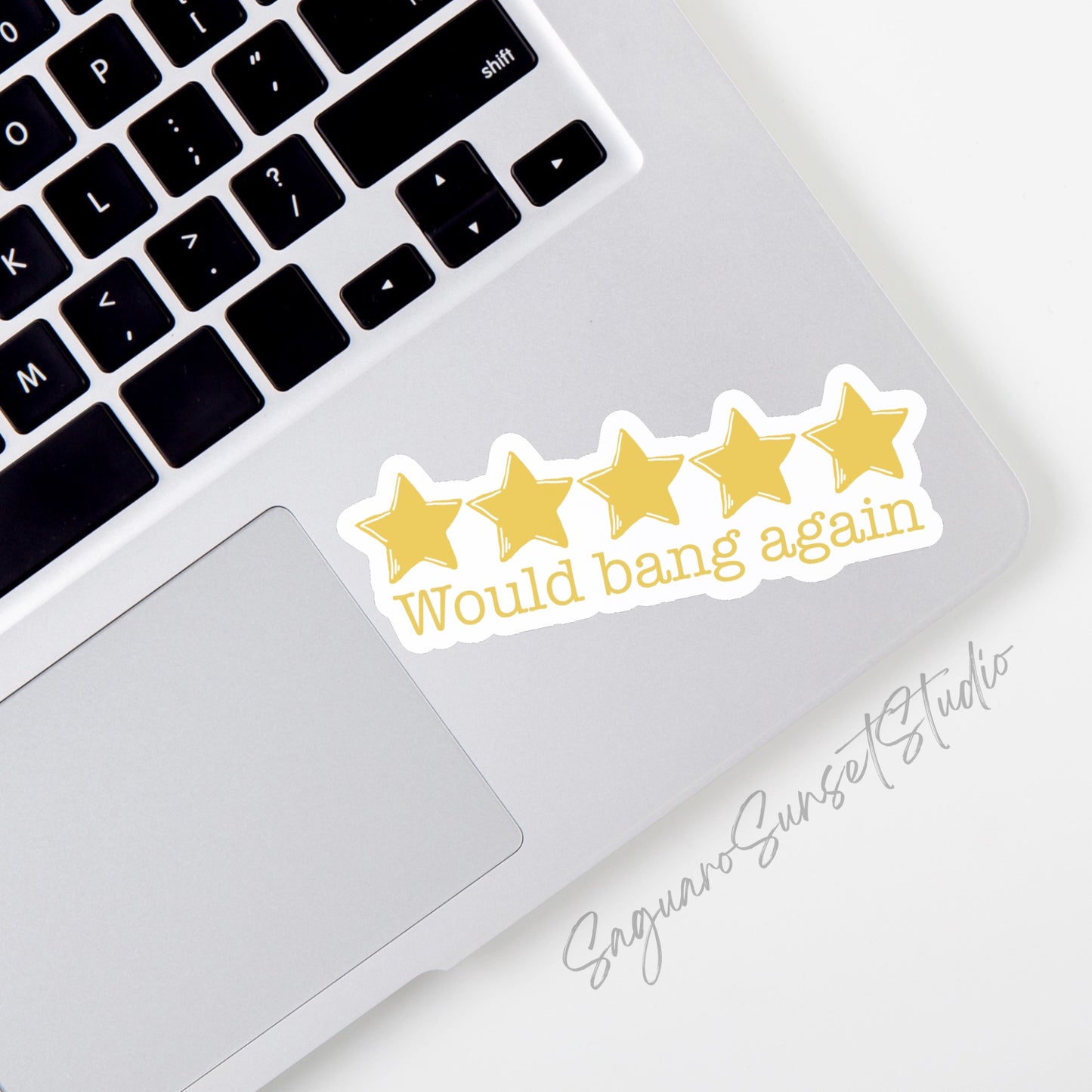 A sticker on the corner of a laptop with five yellow stars and the text 'would bang again'.A sticker with five gold stars and the phrase "Would Bang Again," perfect for adding humor and personality to any surface.