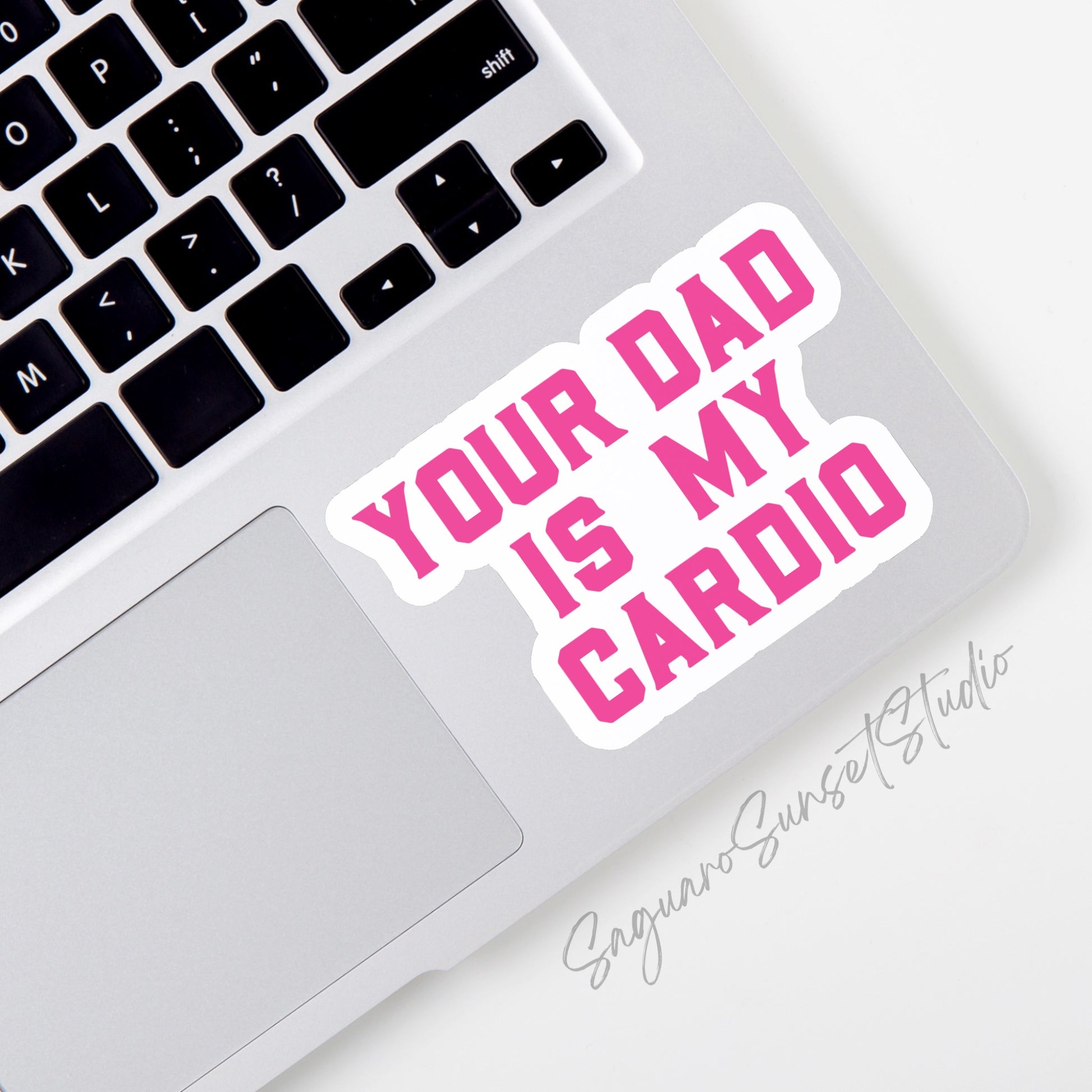 A sticker with the phrase "Your Dad is My Cardio" written in bold pink text on a white background. 