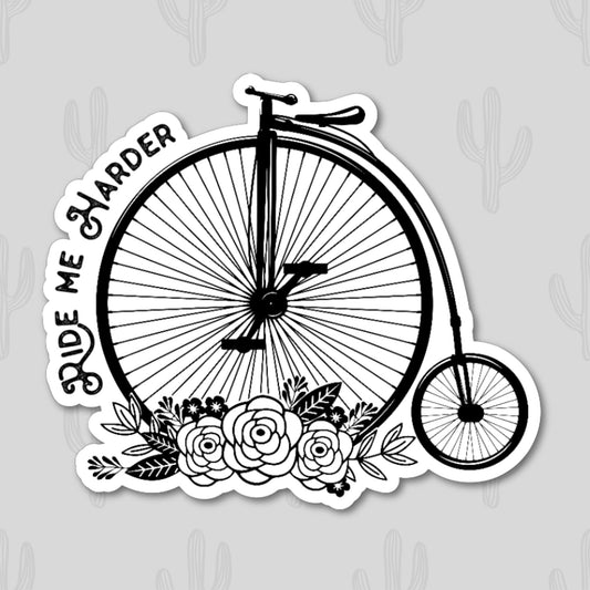 Sticker featuring a classic bicycle with the phrase "Ride Me Harder," designed to add vintage charm and humor to personal items.