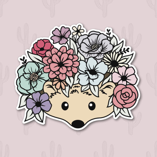 A vinyl sticker featuring a cute hedgehog peeking out from a colorful bouquet of flowers