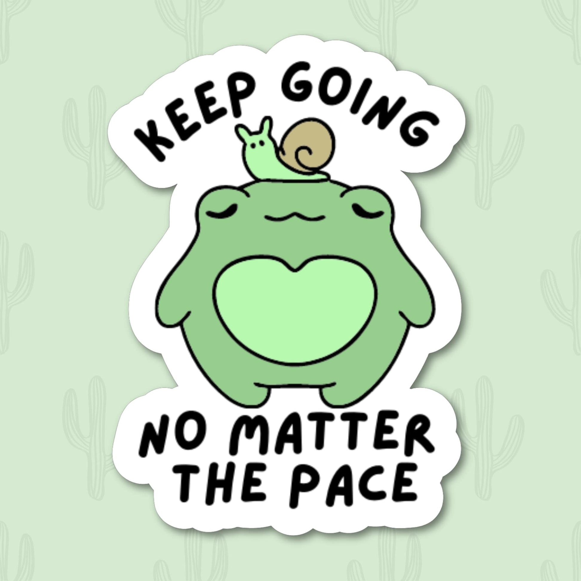 Sticker featuring an adorable frog with a snail on its head and the text "Keep Going No Matter The Pace."