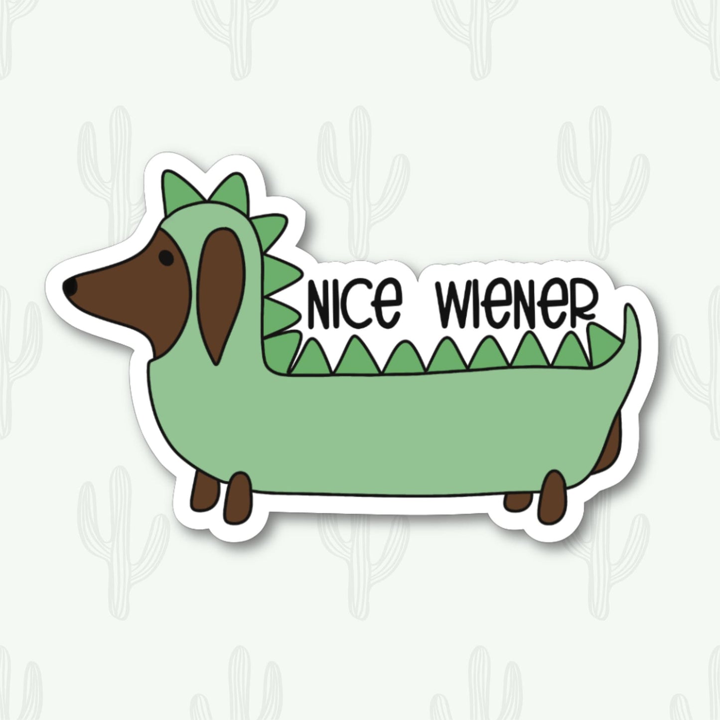 Sticker featuring a dachshund dressed in a green dinosaur costume with the phrase "Nice Wiener"