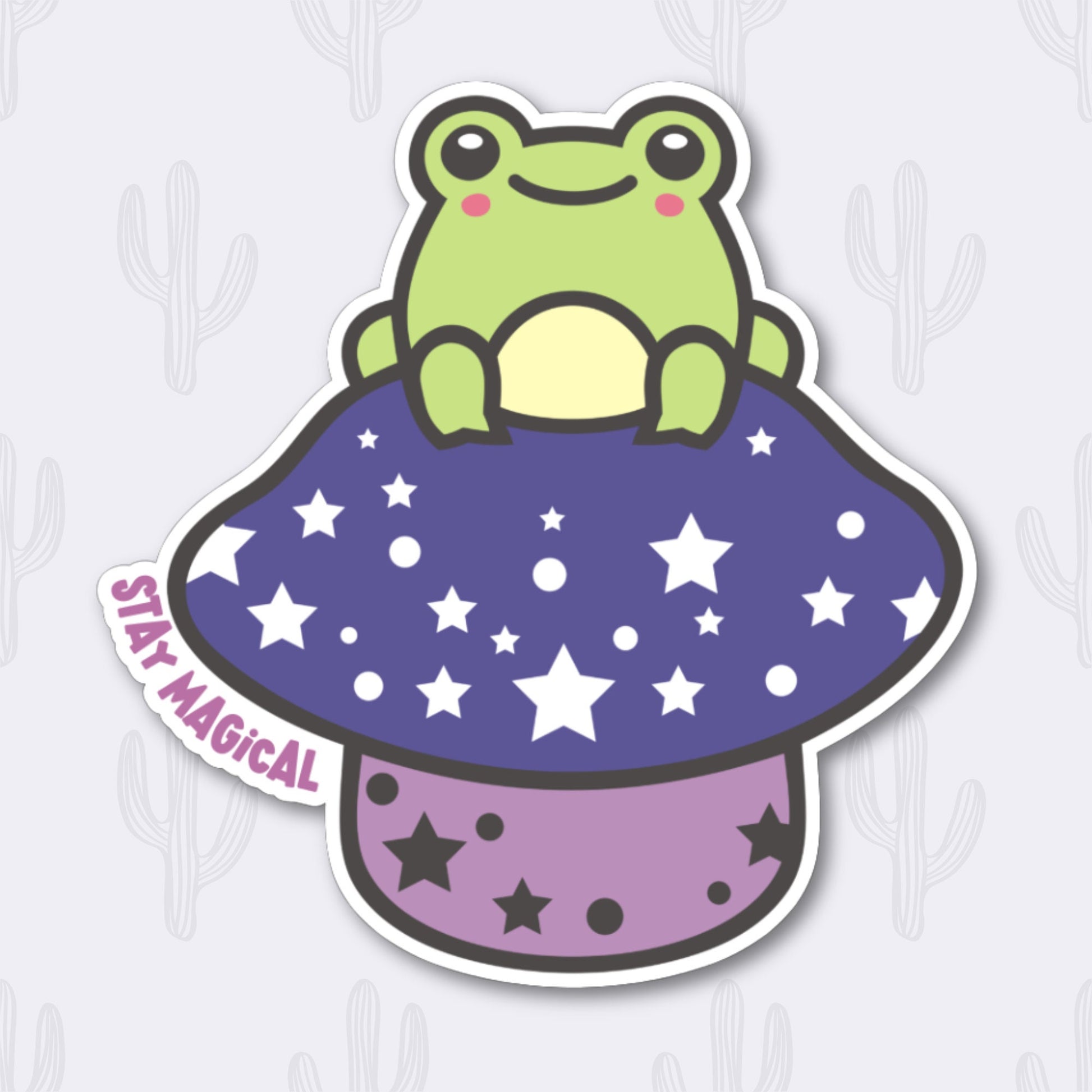 Sticker featuring a cute frog on a starry purple mushroom with the phrase "Stay Magical," designed to add enchantment to personal items.