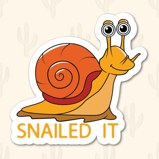 Sticker featuring a happy orange snail with the phrase "Snailed It," designed to add humor and celebrate achievements.