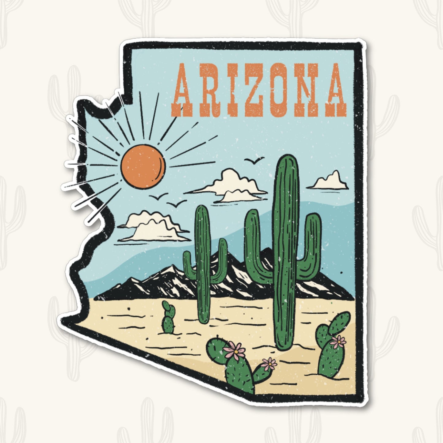 A sticker featuring the shape of Arizona filled with a desert landscape scene. The design includes tall cacti, blooming cacti, mountains, clouds, and a bright sun against a blue sky. The word "Arizona" is written in bold orange letters at the top. 