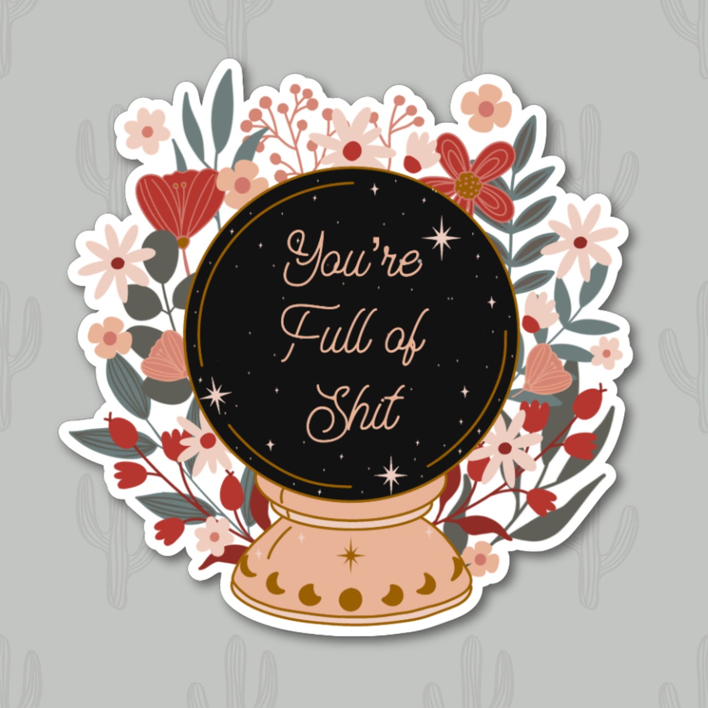 A sticker featuring a mystical crystal ball with the phrase "You're Full of Shit" written in elegant script. The crystal ball is surrounded by a floral arrangement.