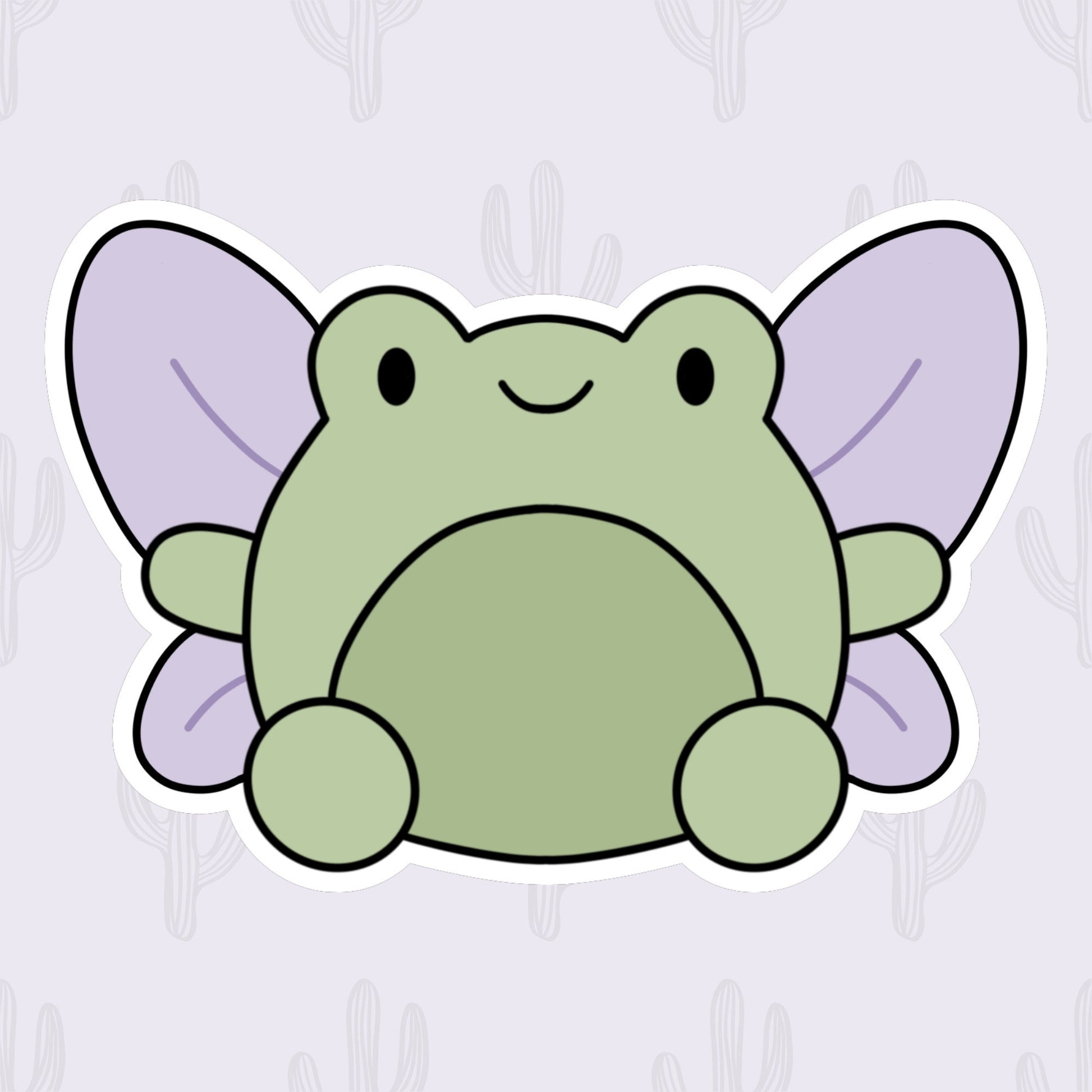 A vinyl sticker featuring a cute green frog with lilac colored fairy wings